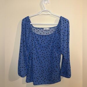 Ricki’s blue polkadot blouse